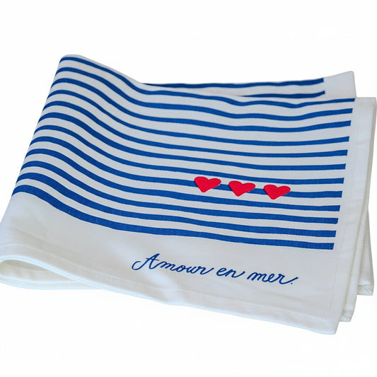 La serviette de table à l'unité "Amour en mer"
