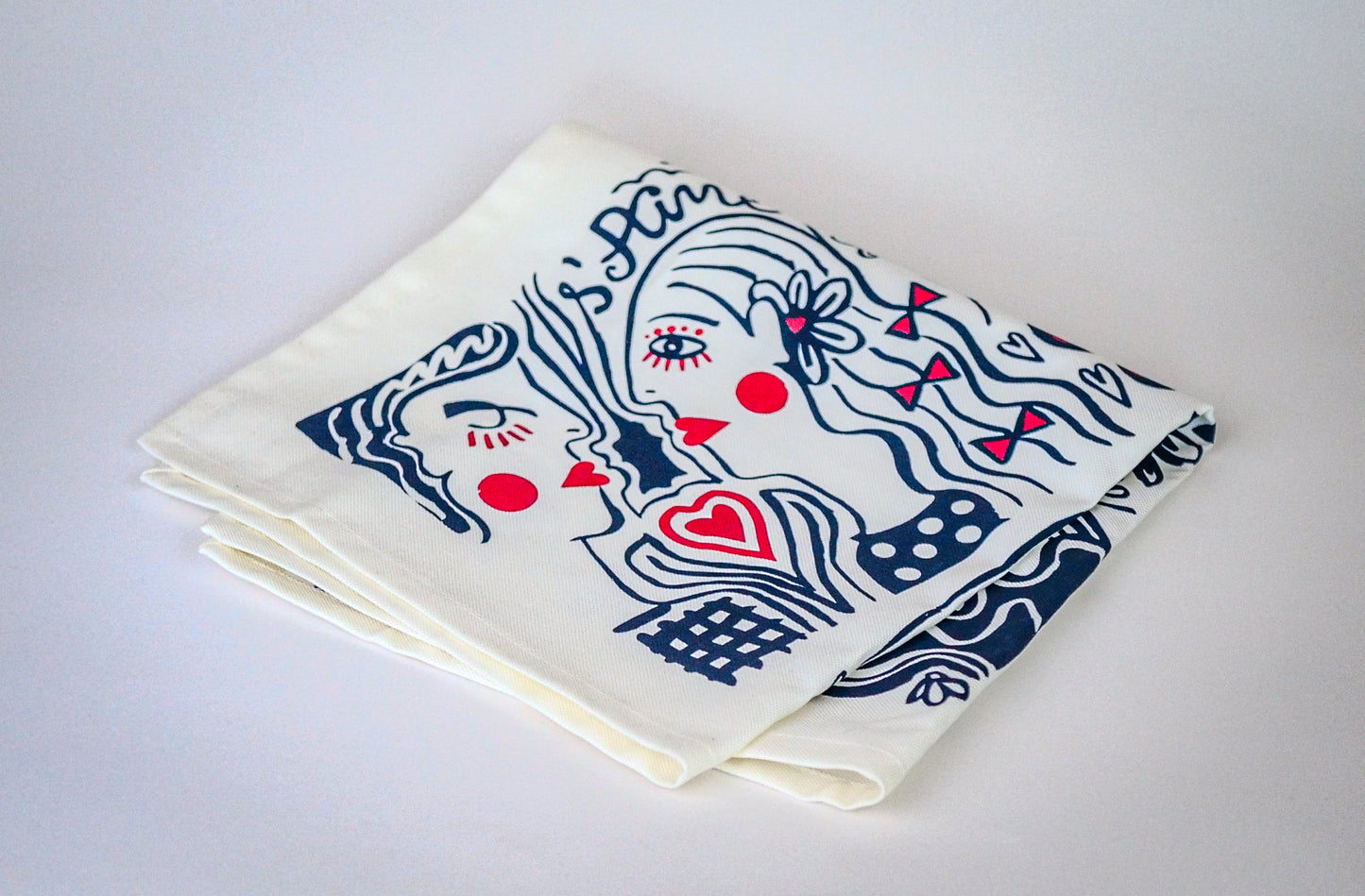 Le duo de serviettes de table et sa pochette