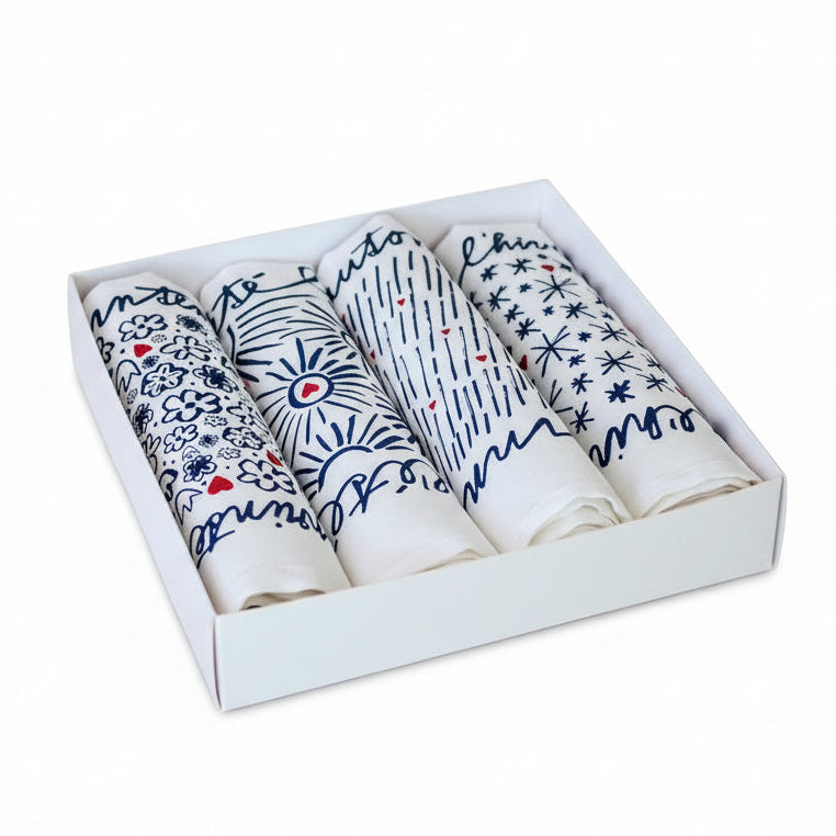 Coffret ouvert 4 serviettes de table de Jana Les 4 Saisons