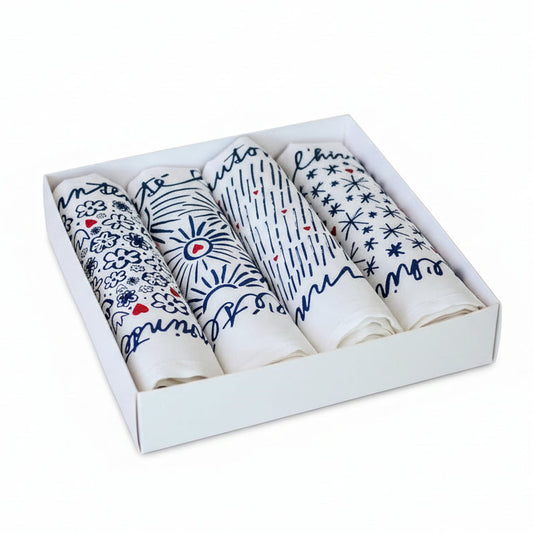 Coffret ouvert 4 serviettes de table de Jana Les 4 Saisons