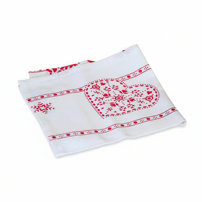 La serviette de Noël en tissu "cœurs de Noël"